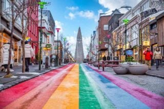 a rainbow painted street it Reykjavík, Iceland, one of the safest places to live in the world